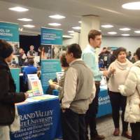 Students stop by the PCEC table